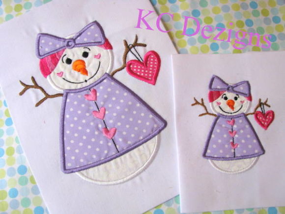 Charming Snow Lady Holding Heart Applique Design